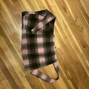 Plaid pink and gray skirt, zip up, tie in front.